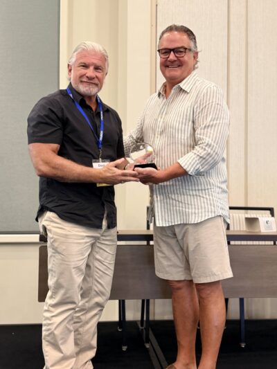 Doug Brewer receives Distinguished Service Award from Glenn Sisk